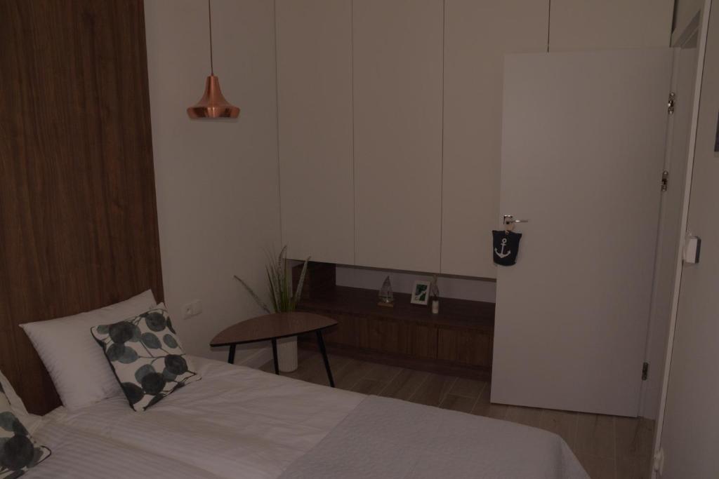 Postel nebo postele na pokoji v ubytování Kite Apart