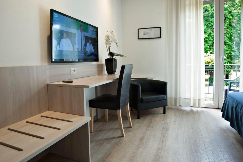 TV a/nebo společenská místnost v ubytování Hotel Garibaldi