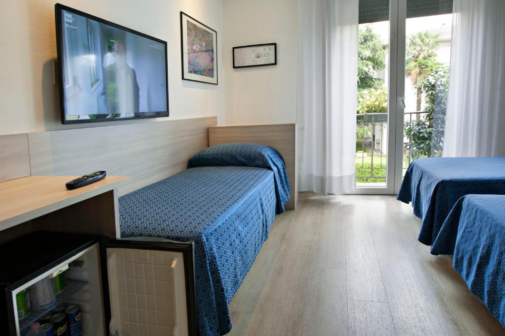 TV a/nebo společenská místnost v ubytování Hotel Garibaldi