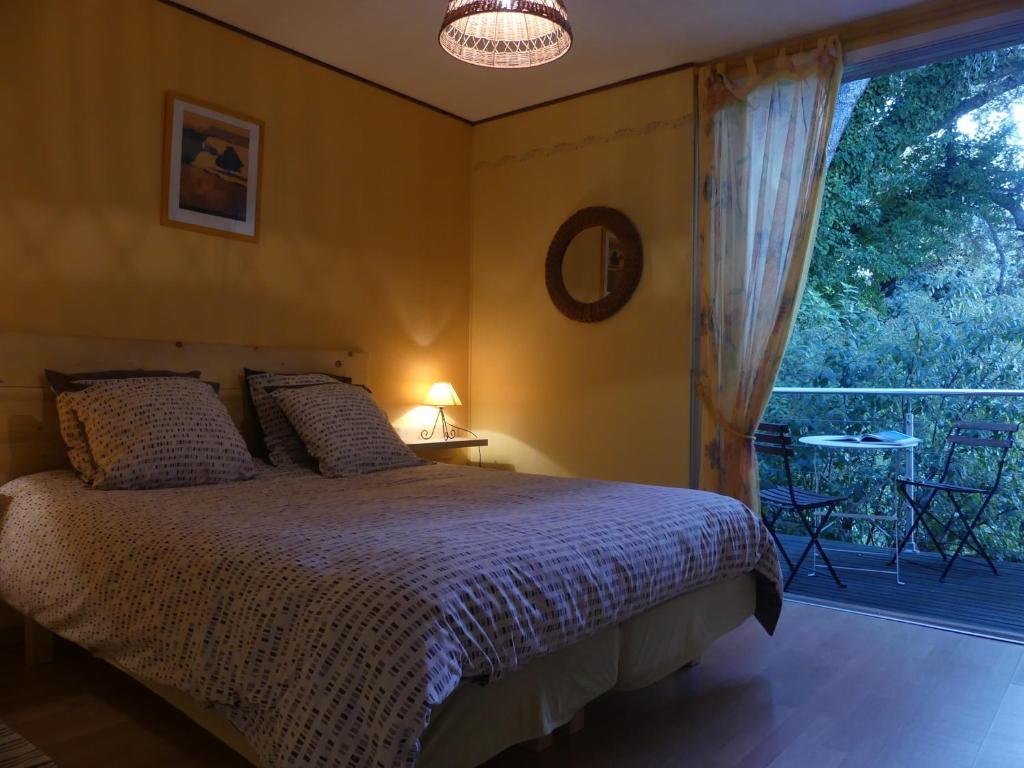 Postel nebo postele na pokoji v ubytování les 3 saisons