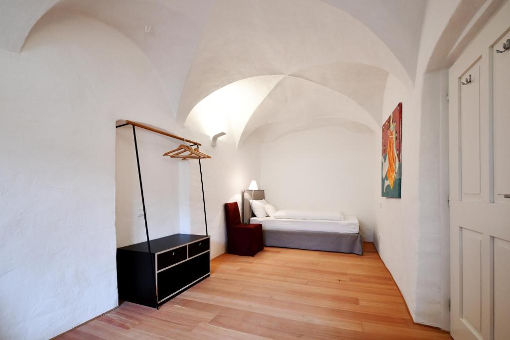 Postel nebo postele na pokoji v ubytování Casa Piganò