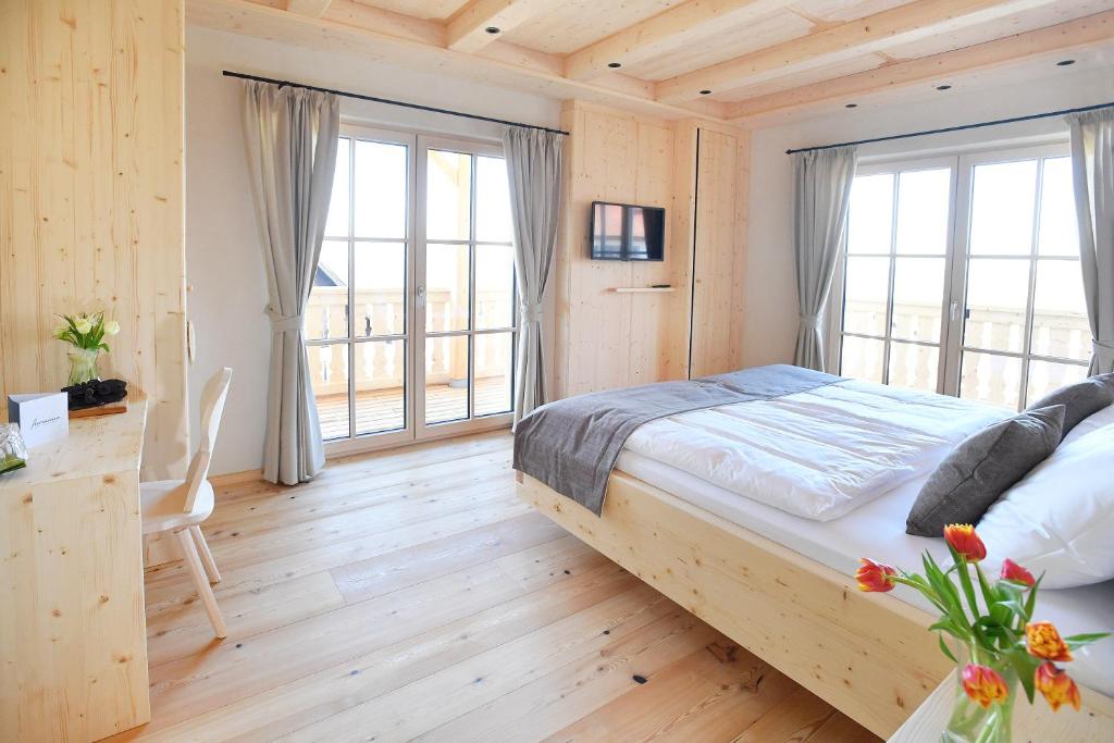 Postel nebo postele na pokoji v ubytování Florineum