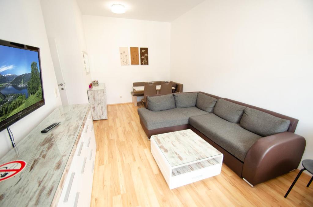 Televízia a/alebo spoločenská miestnosť v ubytovaní Apartment CityXpress TOP 7