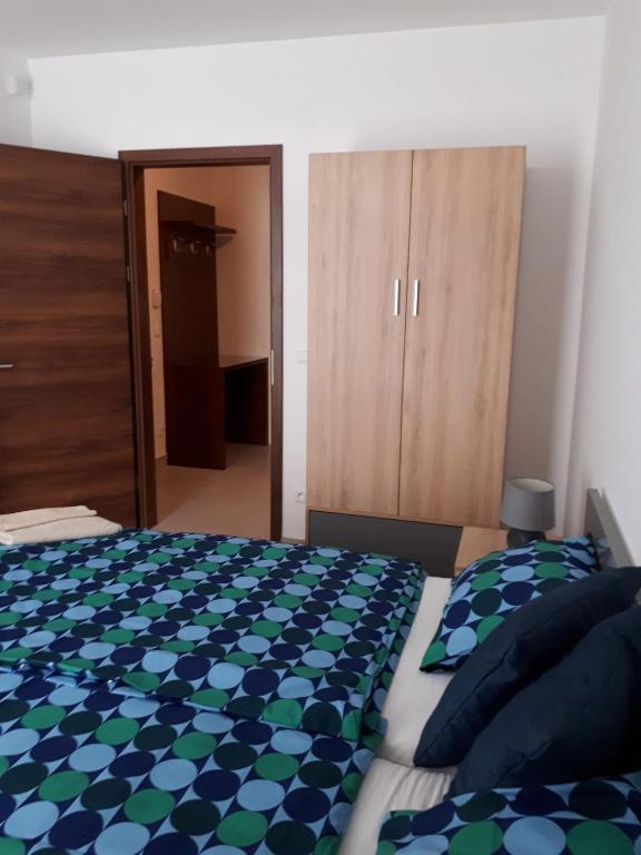 Łóżko lub łóżka w pokoju w obiekcie Balaton Exclusive Apartman