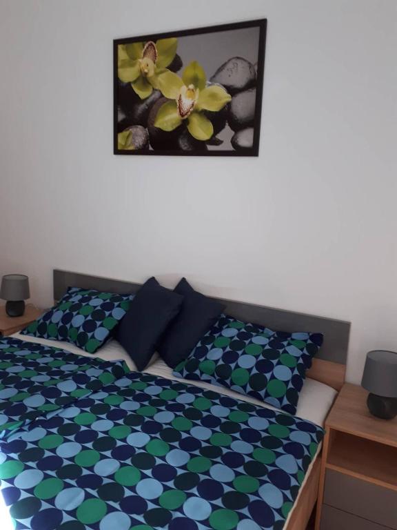 Łóżko lub łóżka w pokoju w obiekcie Balaton Exclusive Apartman