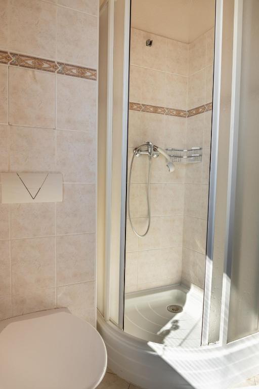 Koupelna v ubytování Hotel Kanarek