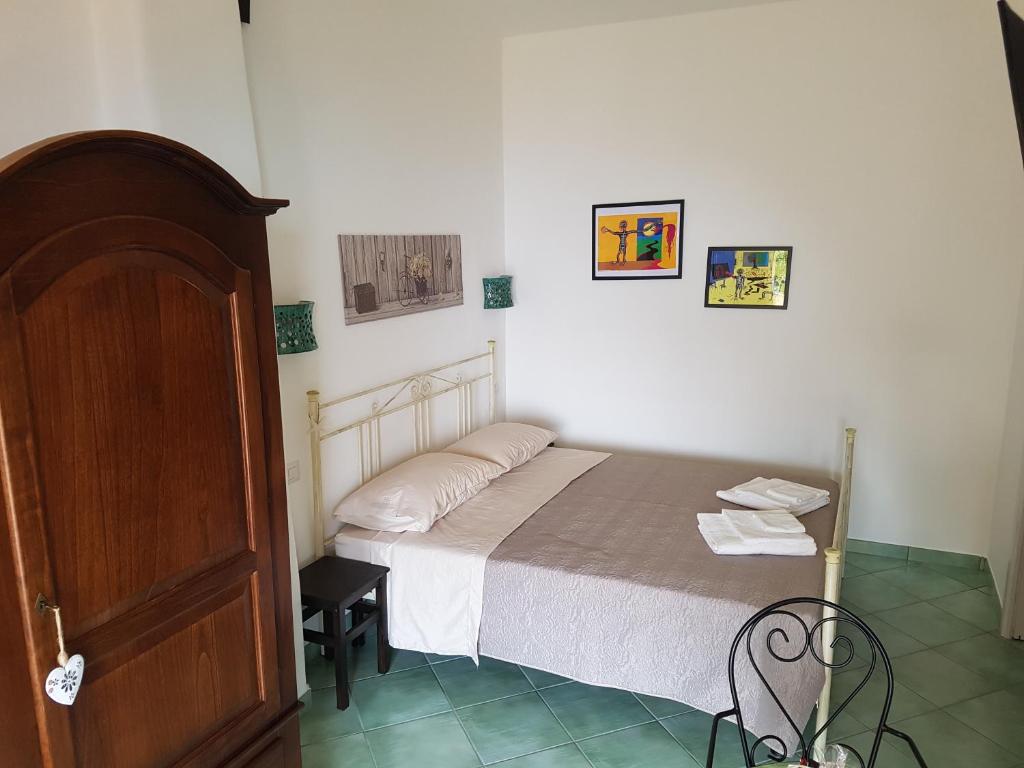 Postel nebo postele na pokoji v ubytování B&B nonnAngela