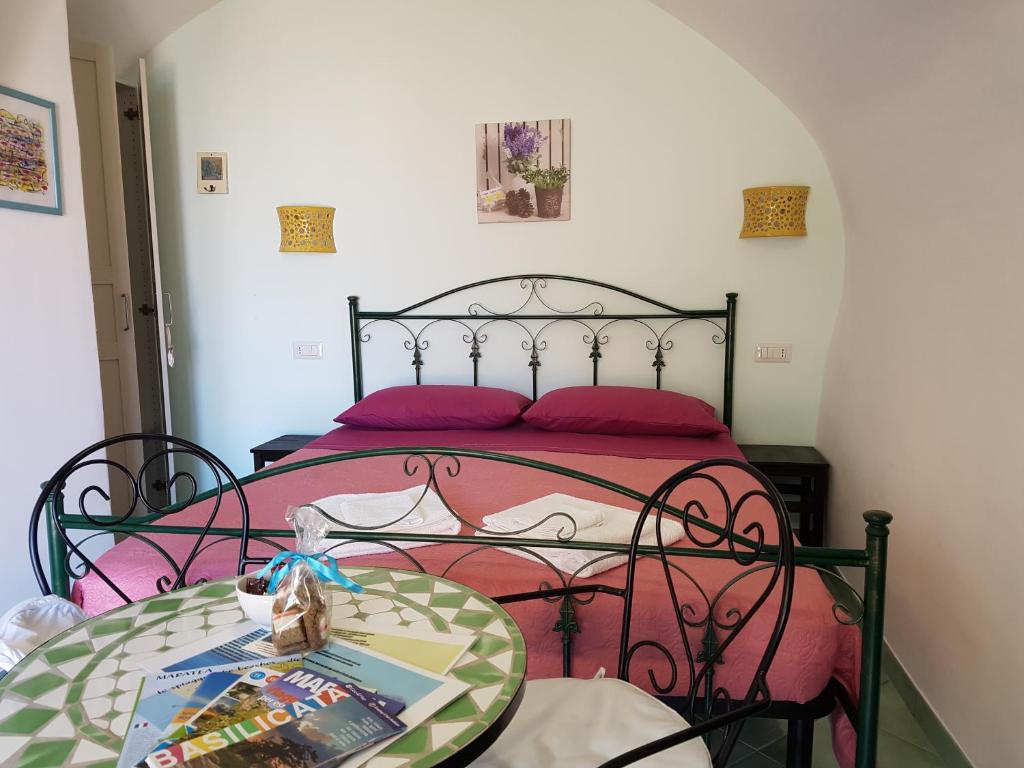 Postel nebo postele na pokoji v ubytování B&B nonnAngela