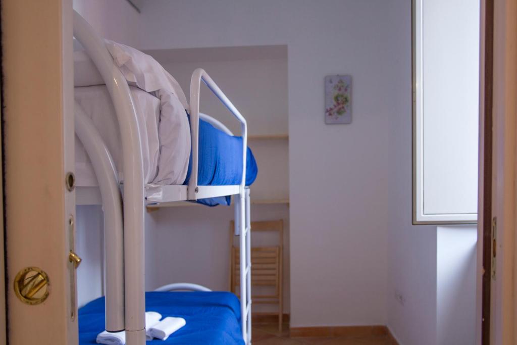 Postel nebo postele na pokoji v ubytování Il Borghetto Apartments & Rooms