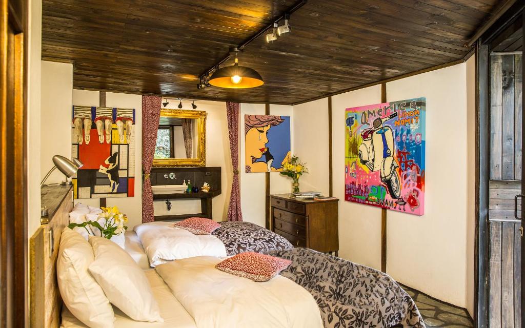 Postel nebo postele na pokoji v ubytování La Colina Hotel Cottage