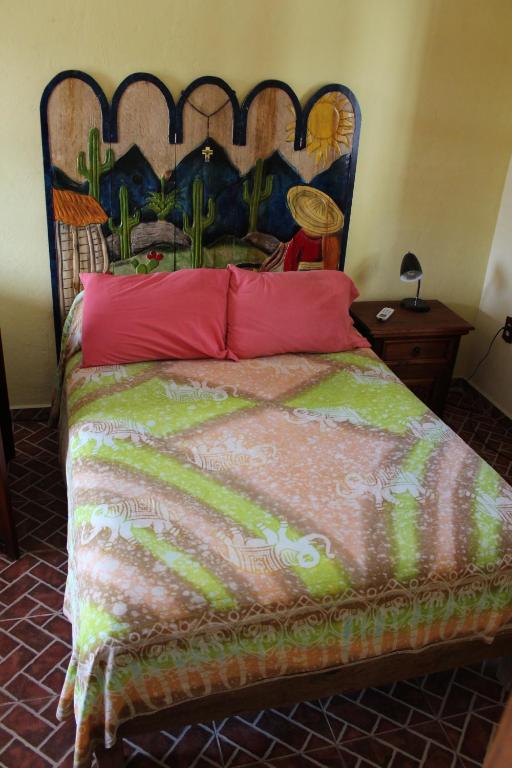 Postel nebo postele na pokoji v ubytování AH KIN Cancun Centro
