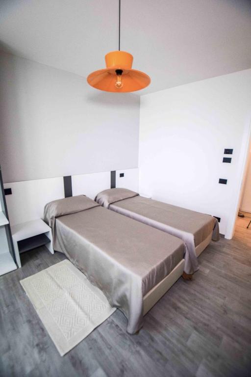 A bed or beds in a room at gambisa street