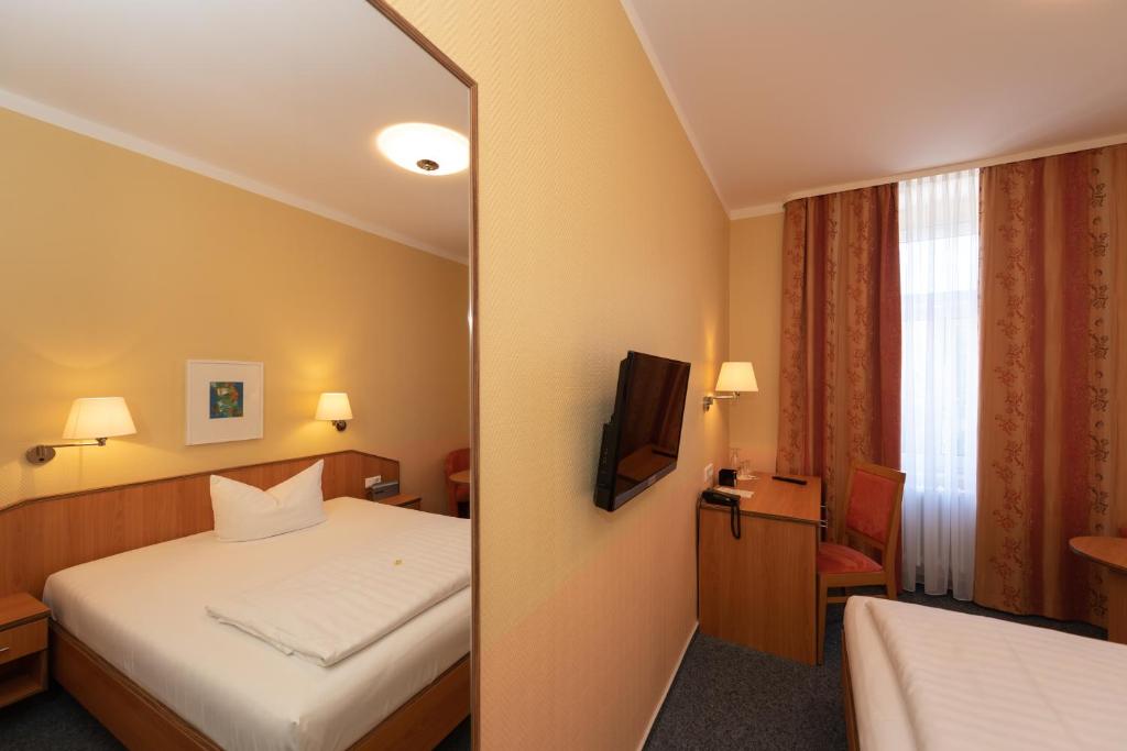 TV a/nebo společenská místnost v ubytování Hotel Europa