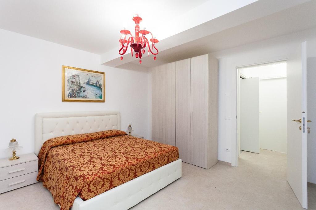 Postel nebo postele na pokoji v ubytování Prince Apartments