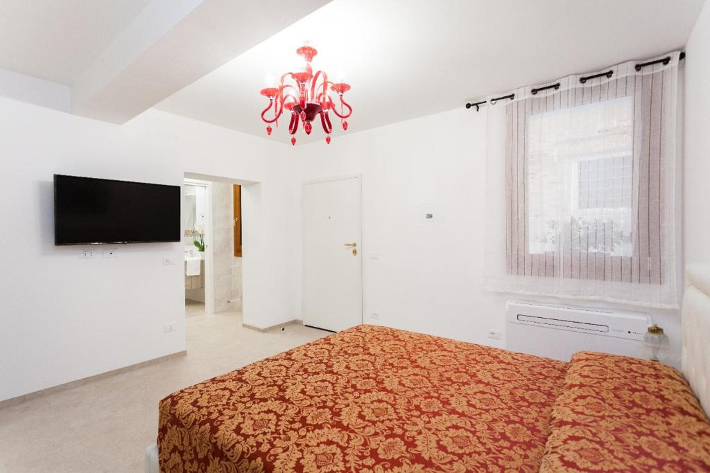 Postel nebo postele na pokoji v ubytování Prince Apartments