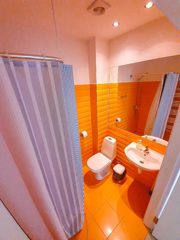 Koupelna v ubytování Mazā Kāpa