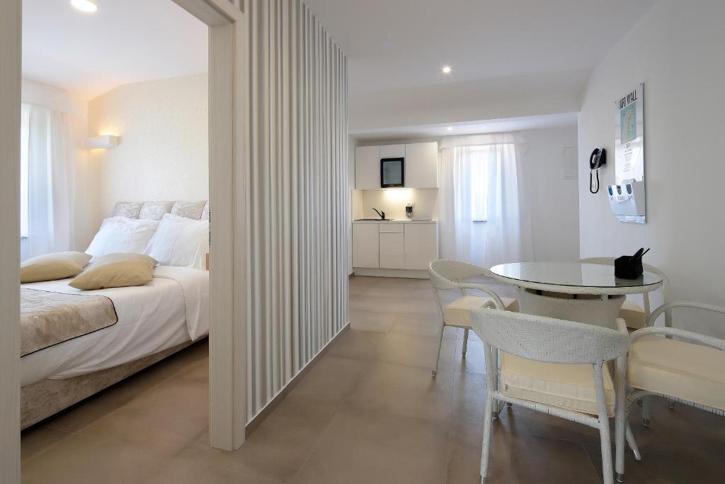 Postel nebo postele na pokoji v ubytování Apartments VIP Residence