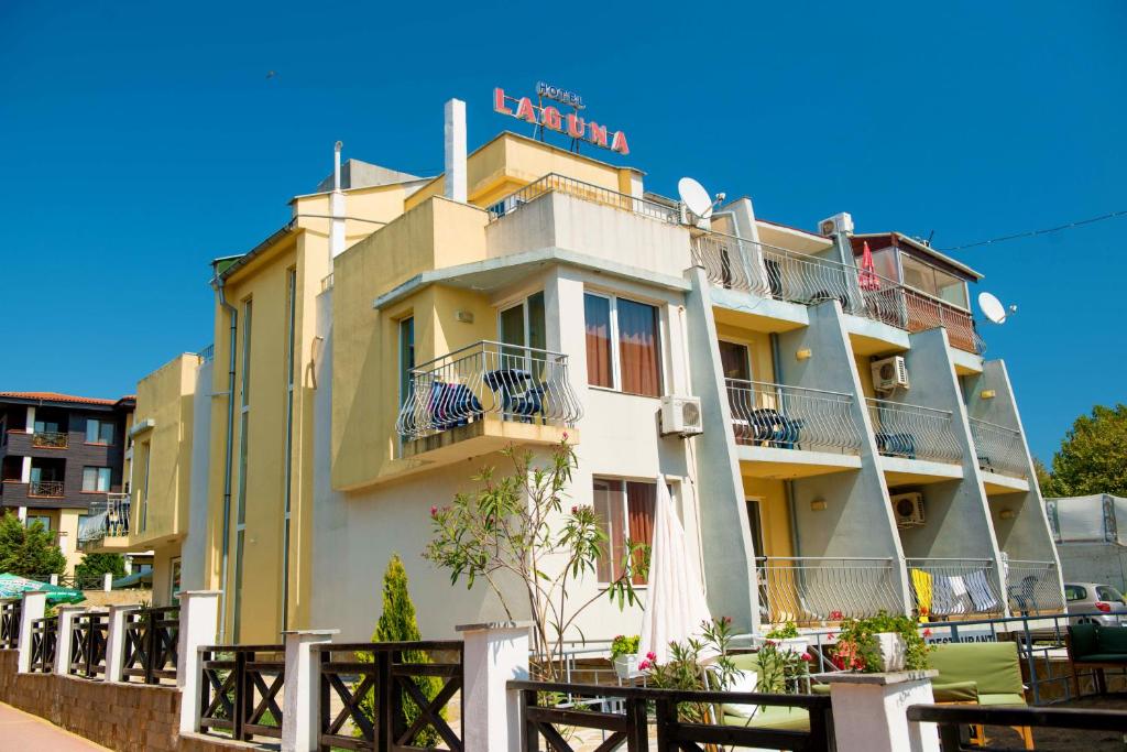 a building with balconies on the side of it at Хотел Лагуна in Chernomorets
