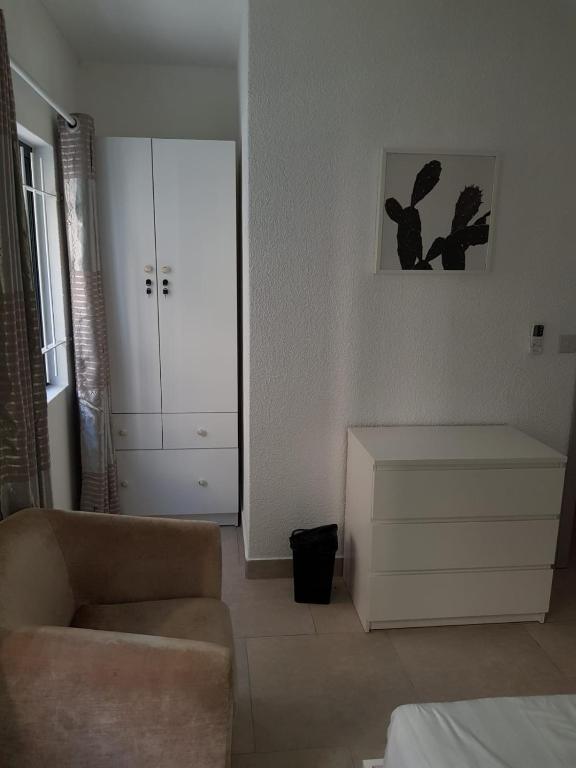 Postel nebo postele na pokoji v ubytování Ibiz Tourist Residence 2