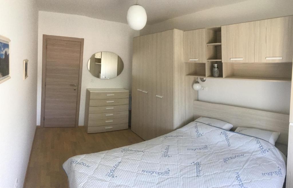 Postel nebo postele na pokoji v ubytování Holly apartman