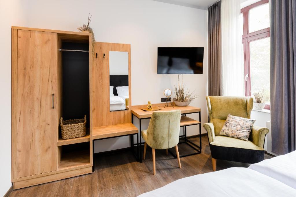 Postel nebo postele na pokoji v ubytování 360 Grad Hotel & Bar