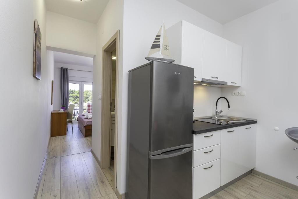 Kuchyňa alebo kuchynka v ubytovaní Apartment Božo