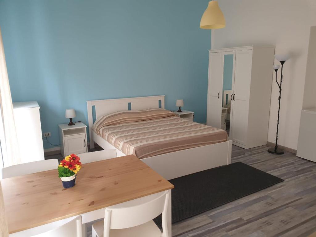 Postel nebo postele na pokoji v ubytování Lipari Suite Apartament