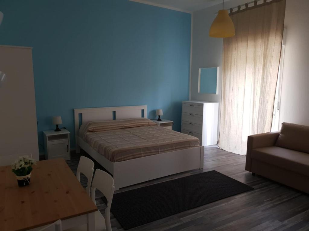 Postel nebo postele na pokoji v ubytování Lipari Suite Apartament
