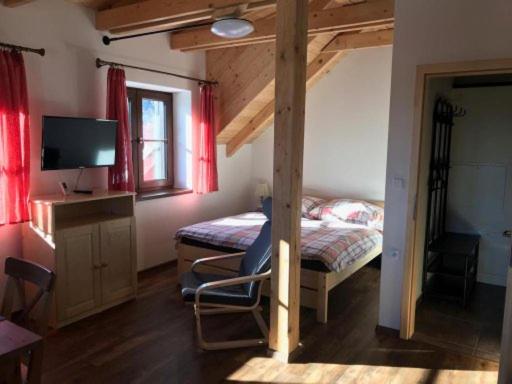 Postel nebo postele na pokoji v ubytování Apartmány Verunka