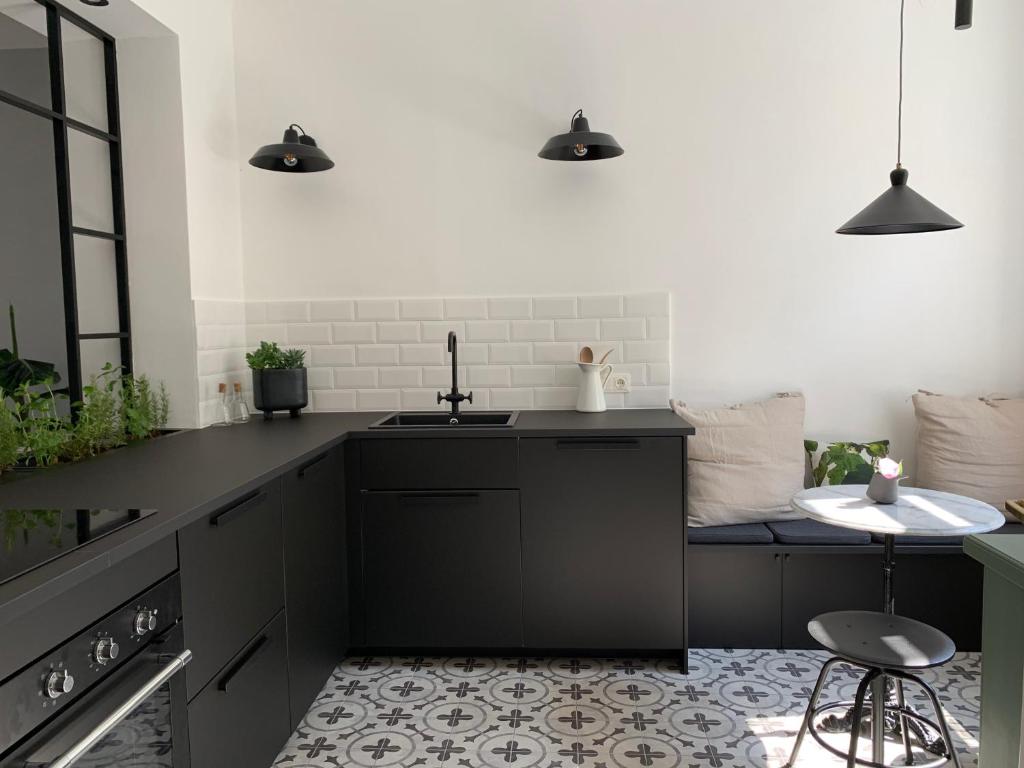 Kuchyň nebo kuchyňský kout v ubytování Boutique Gästehaus Guestel