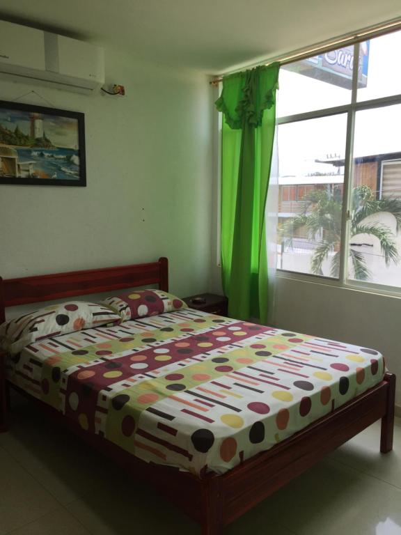 Postel nebo postele na pokoji v ubytování Hostal Sarai