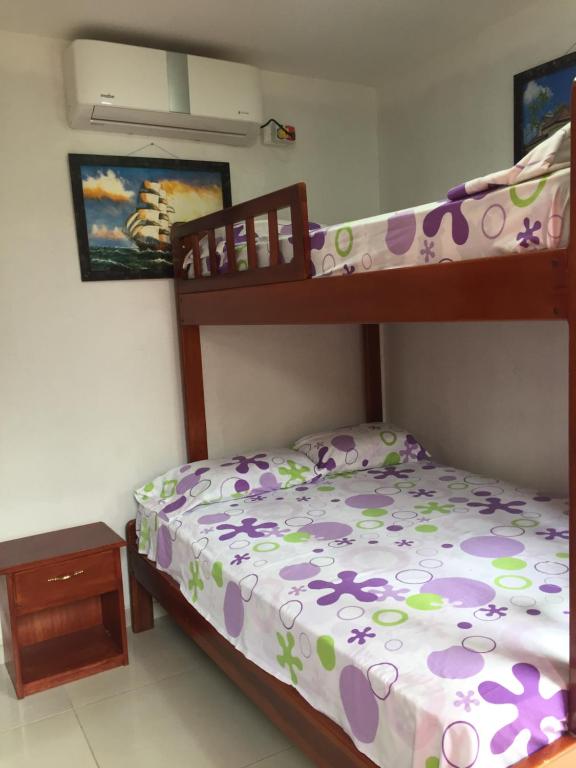 Postel nebo postele na pokoji v ubytování Hostal Sarai
