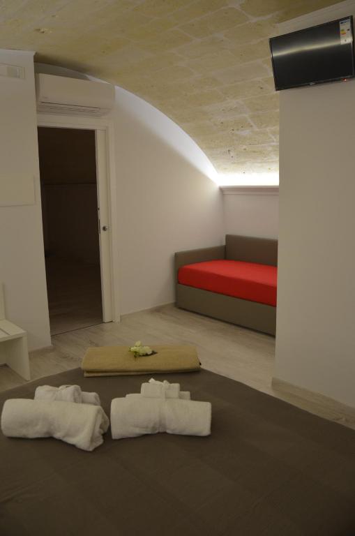 Postel nebo postele na pokoji v ubytování In & Out Matera