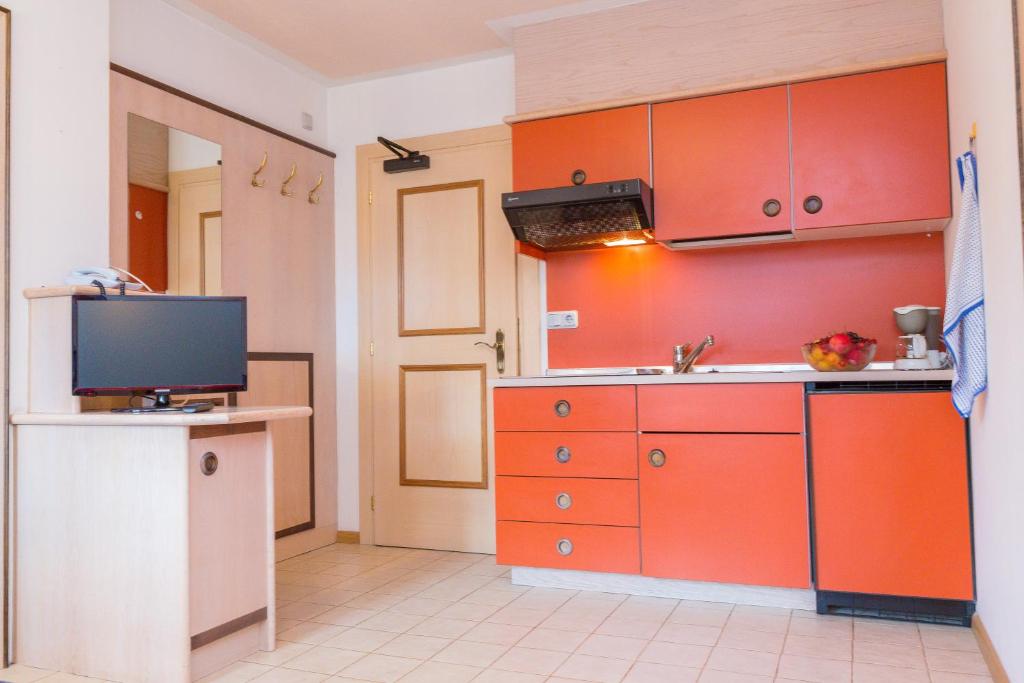 Kuchyň nebo kuchyňský kout v ubytování Camping Olympia