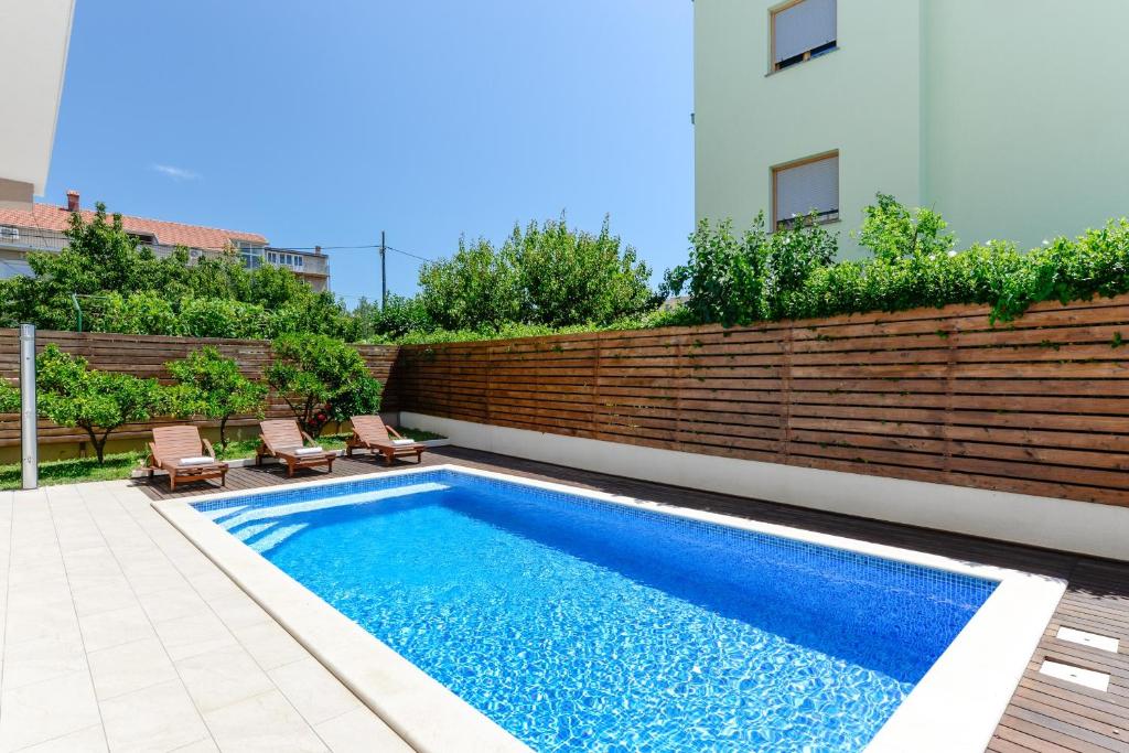 Bazén v ubytovaní Apartmani Bosa alebo v jeho blízkosti