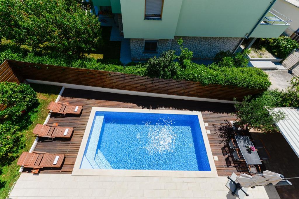Bazén v ubytovaní Apartmani Bosa alebo v jeho blízkosti