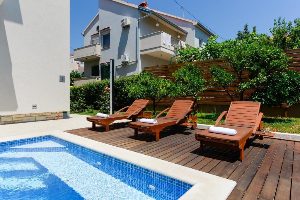Bazén v ubytovaní Apartmani Bosa alebo v jeho blízkosti