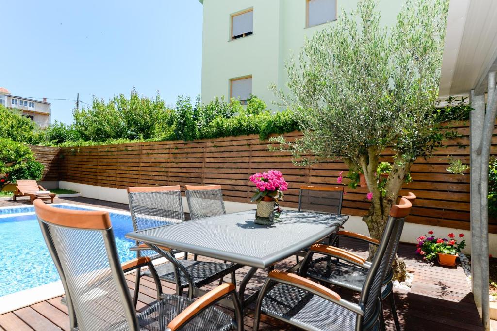 Bazén v ubytovaní Apartmani Bosa alebo v jeho blízkosti