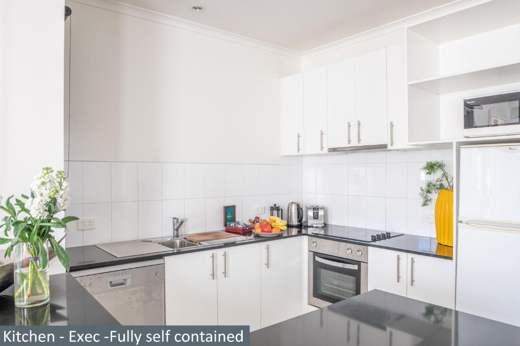 Clocktower Apartment Hotel - Resim 19