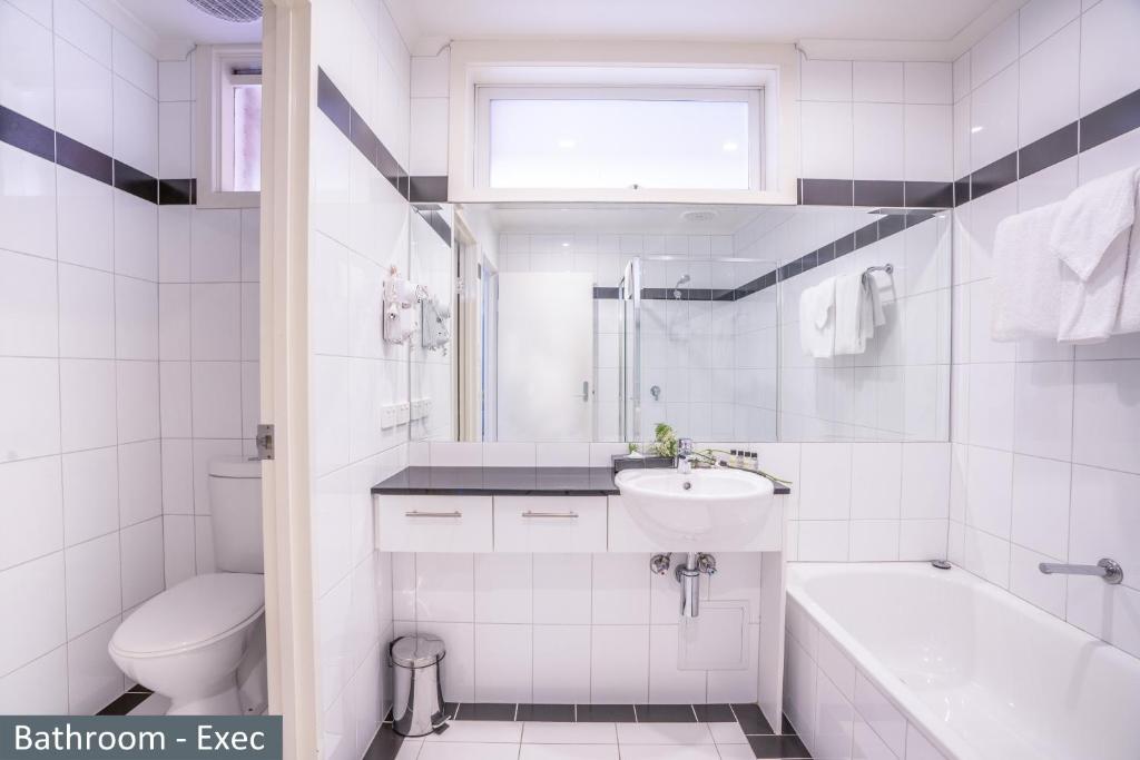 Koupelna v ubytování Clocktower Apartment Hotel