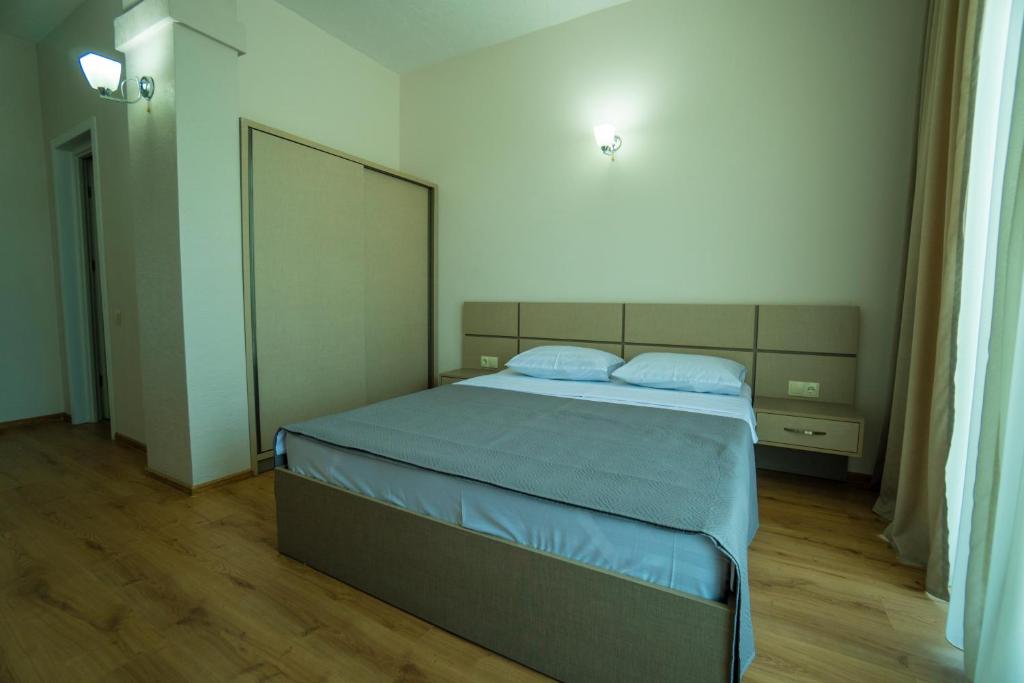 Postel nebo postele na pokoji v ubytování Twins