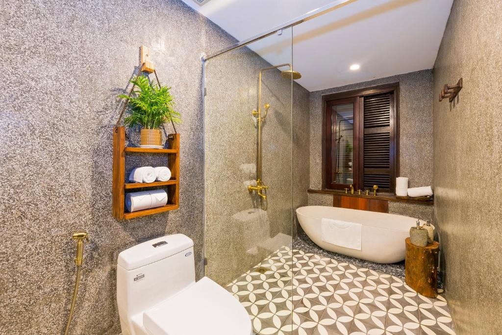 Koupelna v ubytování Zest Resort & Spa Hoi An