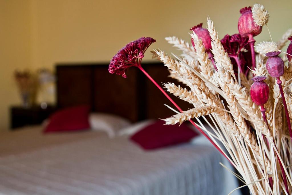 Postel nebo postele na pokoji v ubytování Posada Real del Pinar