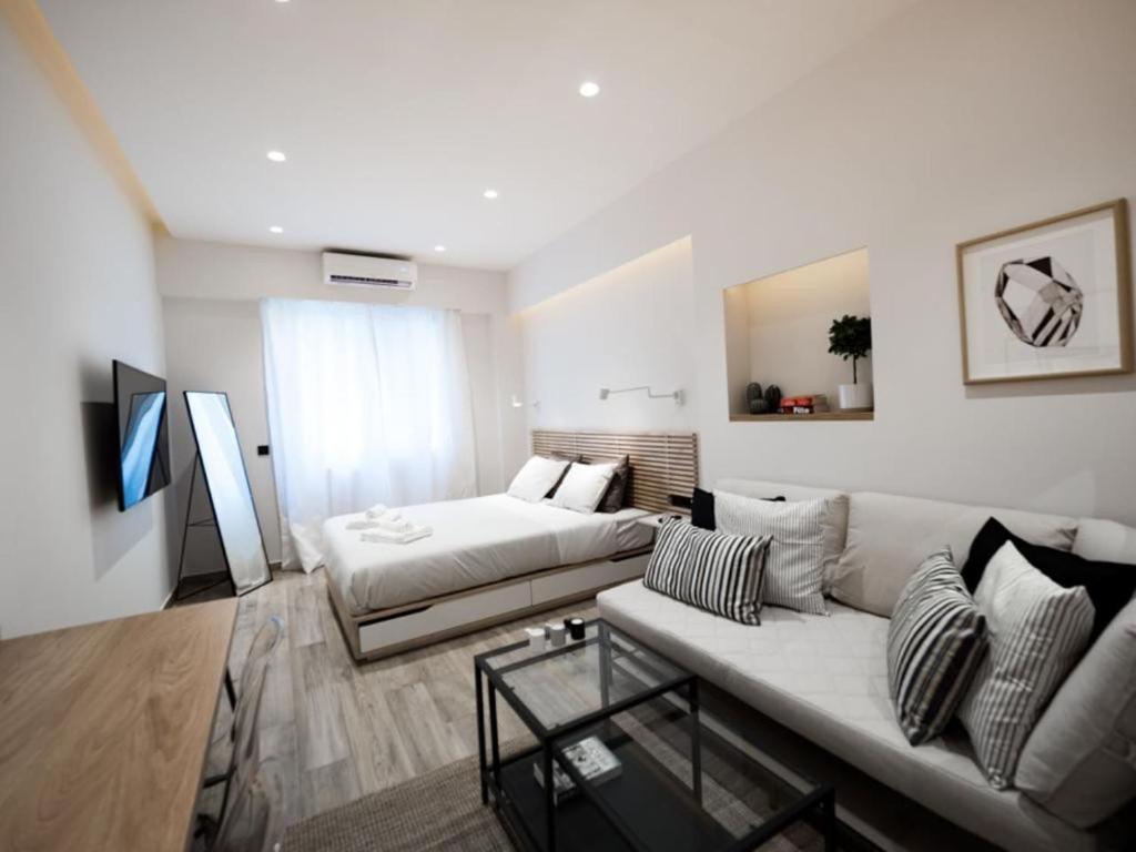 A television and/or entertainment centre at Downtown Syntagma apartment 2