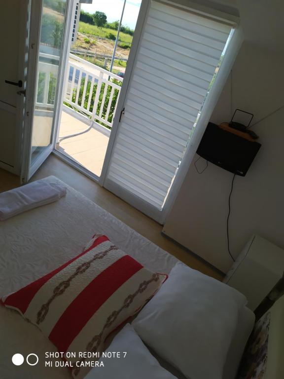 Posteľ alebo postele v izbe v ubytovaní Apartmant Sučić
