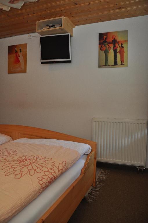 Postel nebo postele na pokoji v ubytování Haus Freispitzblick