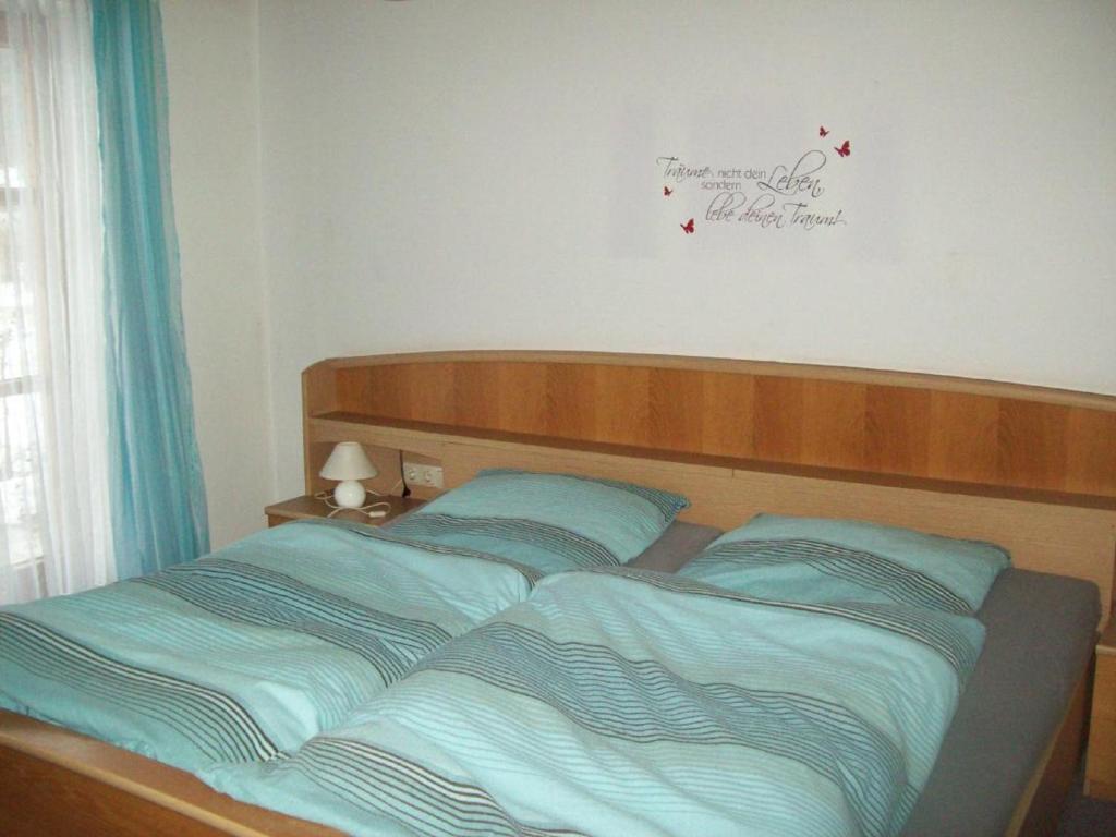 Postel nebo postele na pokoji v ubytování Ferienwohnung Max und Klaudia Müller