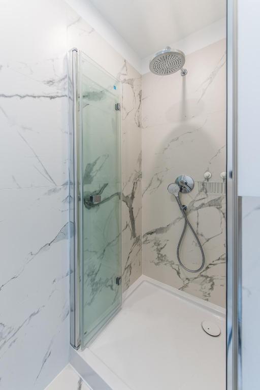 Kúpeľňa v ubytovaní Apartamenty Czwarte Piętro