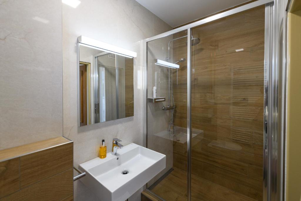 Koupelna v ubytování Sport-V-Hotel