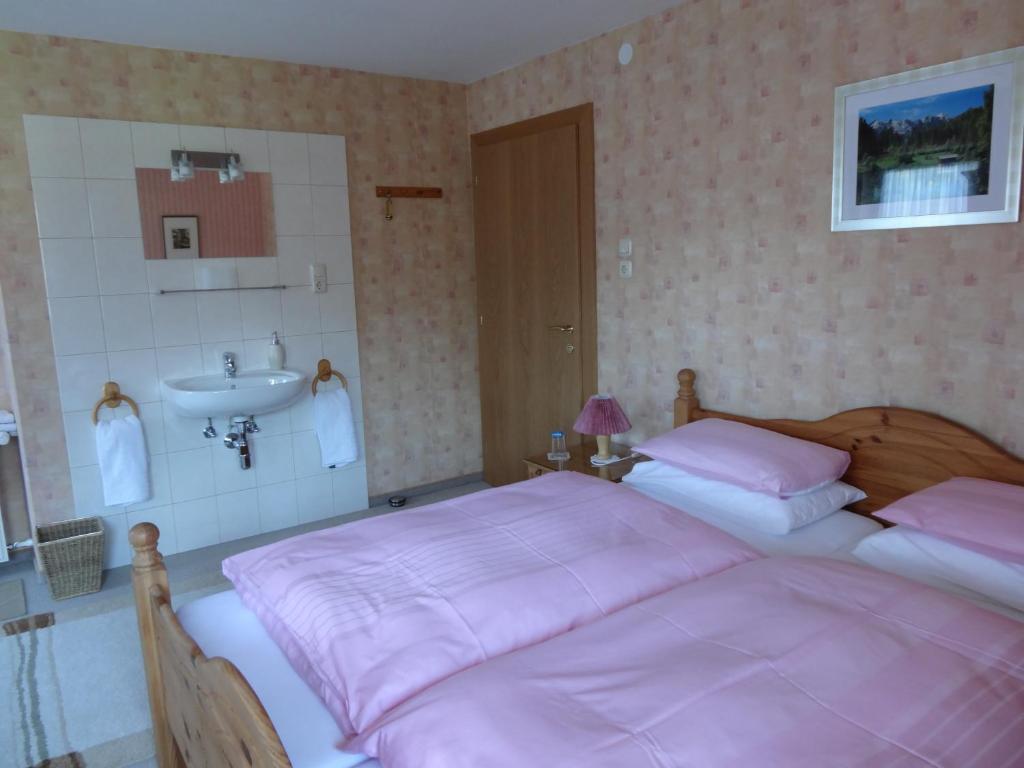 Postel nebo postele na pokoji v ubytování Haus Karl's Ruh